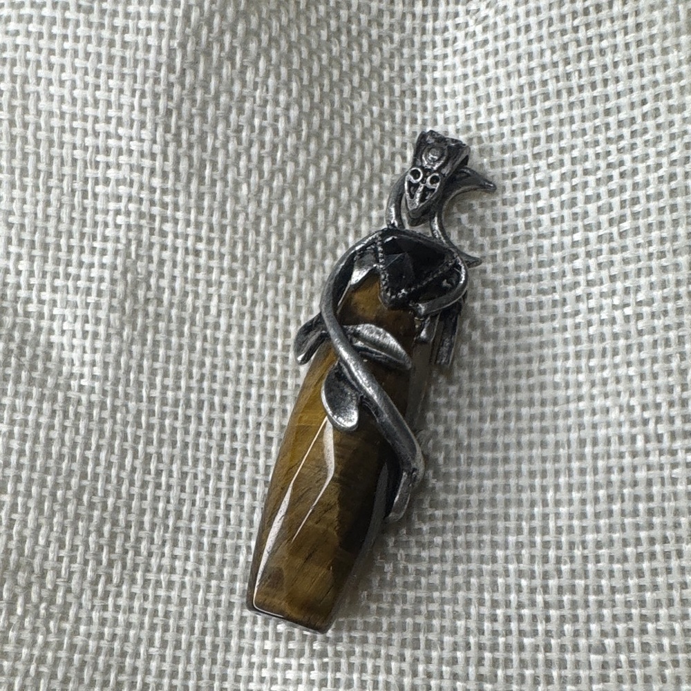 Silver and Brown Artistic Brooch